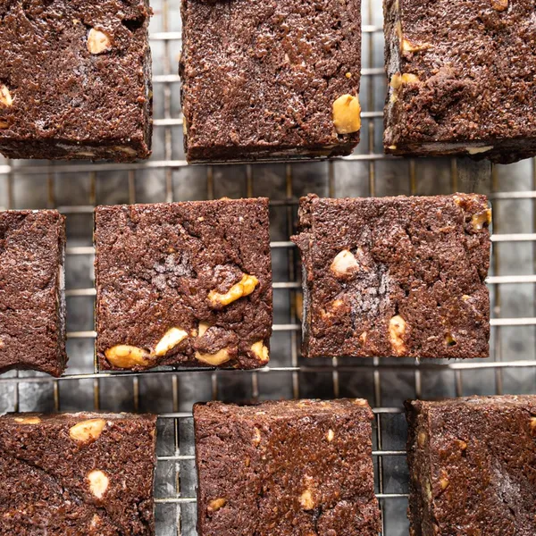 Classic White Chocolate Chunk, Toasted Almond & Walnut Brownies close up view